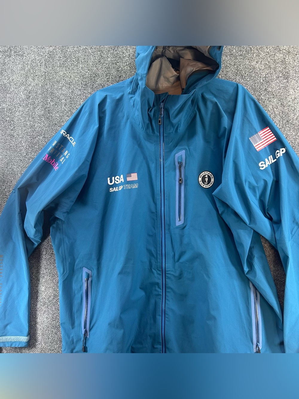 NWOT SailGP Team USA Mustang Survival Rain Jacket XXL Blue Oracle T-Mobile RARE